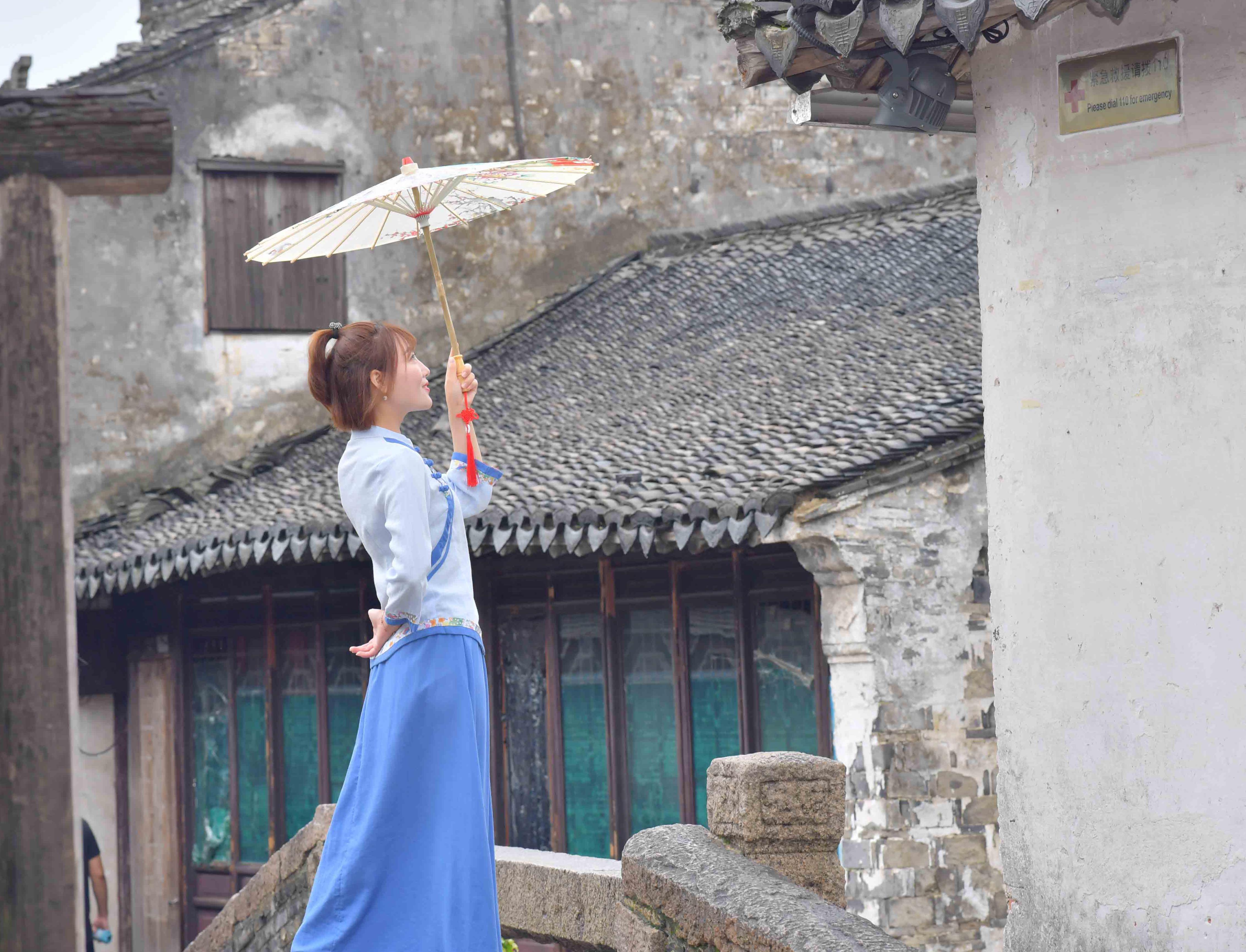 在雨后的周庄古镇里，寻一个人与周庄的千年爱恋